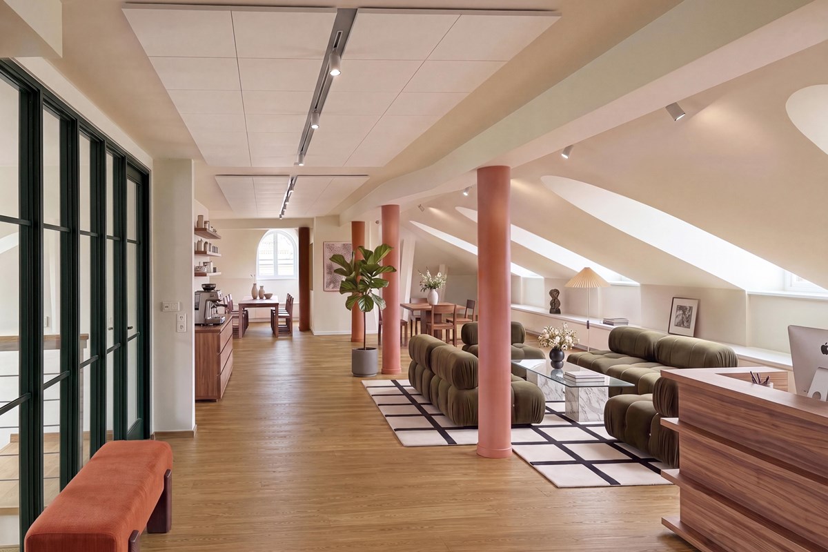 Visionsbild av nyrenoverad entré med reception och lounge-yta